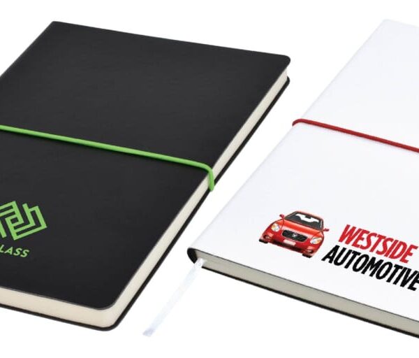 Two notebooks with elastic bands. The black notebook has a green elastic band and an AUSGLASS logo. The white notebook has a red elastic band, a pen holder, and a WESTSIDE AUTOMOTIVE logo with a red car graphic.