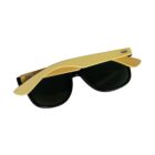 A pair of sunglasses with black frames and dark lenses. The sunglasses have wooden temples with a curved design, shown in a folded position.