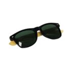 Black sunglasses with dark green lenses and light tan arms displayed against a white background.