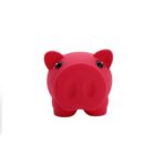 A bright pink piggy bank with a large round snout and small black eyes is centered against a plain white background. The piggy bank is smooth and features simplified cartoon-like details.