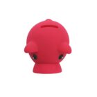 A small, red, rounded toy figure with a slot on top, resembling an abstract animal with two small ears and two black eyes. It is set against a plain white background.