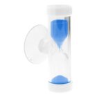 Clear plastic hourglass timer with white caps, a suction cup on the side, and blue sand inside. The sand is partially settled in the bottom half. The timer is oriented vertically.