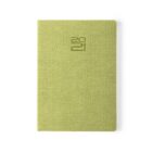Green textured notebook with 2021 embossed on the cover, viewed from above against a plain white background.