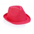 A vibrant pink fedora hat with a subtle textured pattern on the surface, resting on a plain white background. The hat features a classic design with a pinched crown and a short brim.