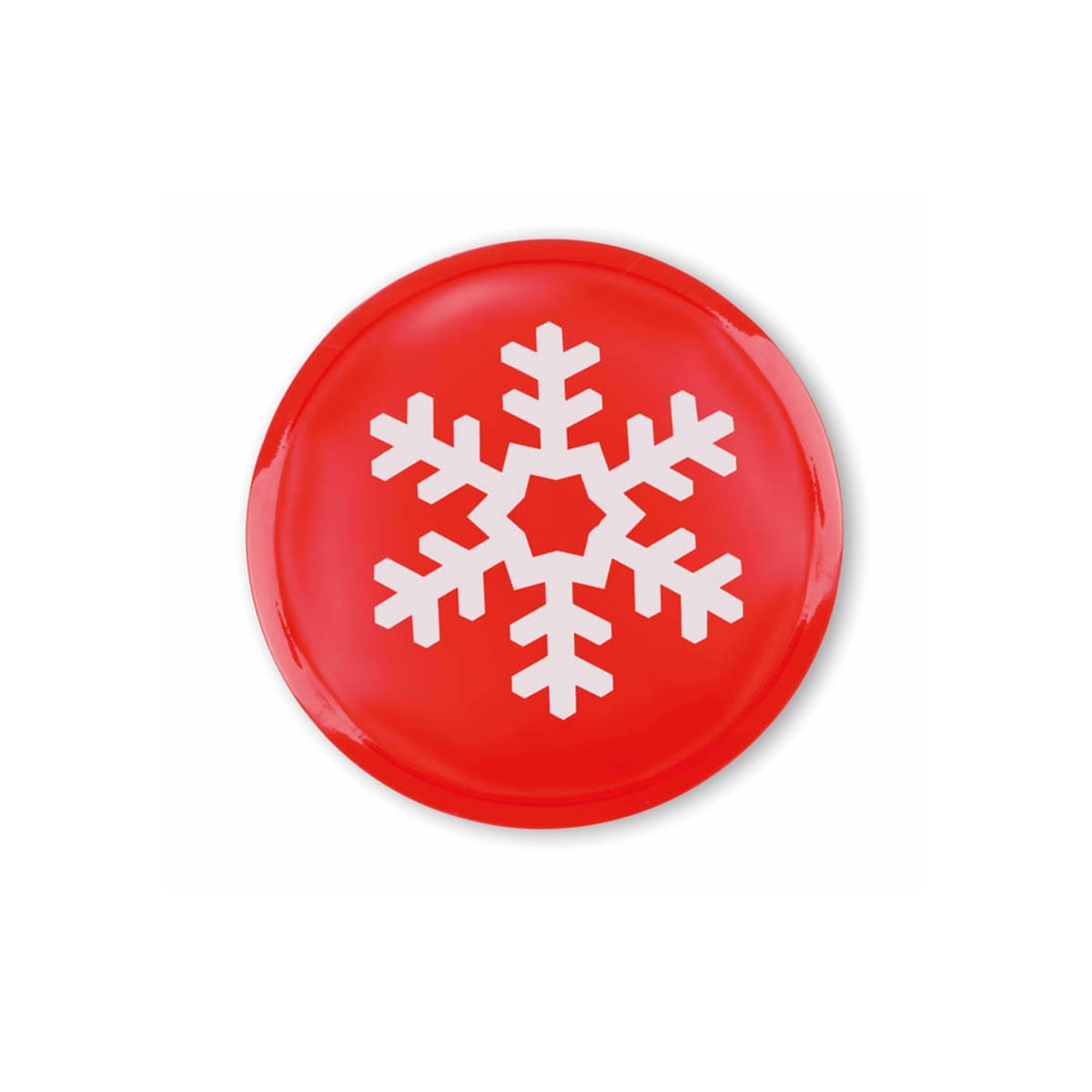 Red circular plate with a white snowflake design in the center.