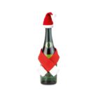 A green wine bottle dressed in a small Santa hat and a red-and-white scarf made of felt. The bottle is centered on a white background.