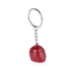 A red, helmet-shaped keychain with a silver keyring and chain attached. The helmet is small and round, resembling a sports helmet.