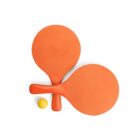 Two bright orange table tennis paddles are crossed, with their handles touching, positioned above a small yellow ball. The paddles and ball are set against a plain white background.