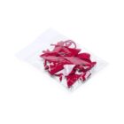 A clear plastic bag containing red felt Christmas tree and star ornaments.