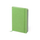 A closed green notebook with a fabric cover and rounded corners. It has an elastic band for closure and a matching green ribbon bookmark peeking out. The notebook stands upright against a white background.