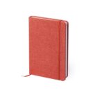 Red hardcover notebook with a textured finish, elastic band closure, and a ribbon bookmark. The notebook is displayed standing at an angle.