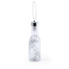 A transparent glass bottle with a silver cap is hanging from a delicate metal chain. Inside the bottle, a string of silver star-shaped decorations is visible. The background is plain white.