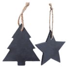 Two black slate ornaments hang by twine loops: one shaped like a Christmas tree and the other like a star. The simple, rustic design suggests a natural, minimalist style.