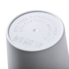 The bottom of a white cup with embossed text stating BPA free, phthalate-free, compostable, max 50°C. Symbols for recycling, contact with food, and dishwasher-safe are visible. The surface is smooth and matte.