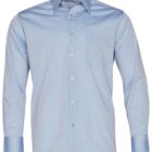 A light blue, long-sleeved dress shirt with a front pocket and button closure. It features a spread collar and buttoned cuffs, displayed against a plain white background.