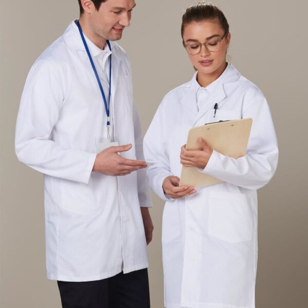 Two individuals in white lab coats stand together. One is holding a clipboard, and the other gestures towards it. They appear to be engaged in discussion, possibly in a professional or clinical setting.