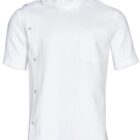 A white, short-sleeved chefs jacket featuring a unique asymmetrical design with metal snap buttons running from the shoulder to the side. It has a high collar and a single chest pocket on the left side.