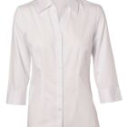 A white, long-sleeve button-up shirt is displayed against a plain background. The shirt has a classic collar and is wrinkle-free, suitable for formal or casual wear.