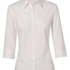 A plain white, collared, long-sleeve button-up shirt is displayed against a white background. The shirt has a classic design with a structured collar and cuffed sleeves, suitable for formal or office wear.
