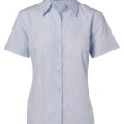 Light blue short-sleeve button-up shirt with a classic collar. The fabric has a subtle striped pattern, and the buttons are white. The shirt is displayed against a plain white background.