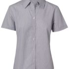 A short-sleeve, button-up gray shirt with a pointed collar is displayed. The shirt features a classic design with visible seams and buttons down the front, offering a clean and professional look.