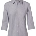 A light gray womens button-up shirt with 3/4 sleeves and a classic collar. The shirt has white buttons and a tailored fit.