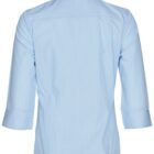 The image shows the back view of a light blue, long-sleeved shirt with a subtle pinstripe pattern. The shirt has a collar and the sleeves are folded up to the elbows.