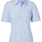 A light blue short-sleeve blouse with thin vertical white stripes, a pointed collar, and buttons down the front. Theres a pocket on the left chest and button detail on the sleeves.
