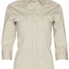 Beige, long-sleeve blouse with a collar and button-up front. Features two chest pockets with button flaps and buttoned shoulder straps. Design suggests a casual or semi-formal style.