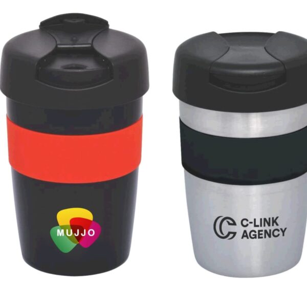 Two reusable coffee cups with lids. The left cup is black with a red band and features the MUJJO logo. The right cup is silver with a black band and displays the C-LINK AGENCY logo.