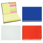 Four closed notebooks in blue, white, and red, alongside an open notebook displaying sticky notes in yellow, pink, and green. Each book has a plain cover.