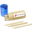 A cardboard tube with a Crossair logo contains colored pencils. The lid is removed, showing the pencils inside. Three pencils are laid out in front. A blue sharpener is placed next to the tube.