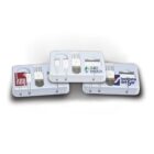 Three white branded charging kits with USB plugs and cables. Each kit features a different company logo: KEU, Duke Energy, and Instituto del Sur, displayed on the respective kit lids.