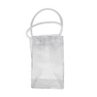 Clear plastic tote bag with sturdy square base, transparent body, and two short handles at the top. The bag is empty and stands upright on its own.