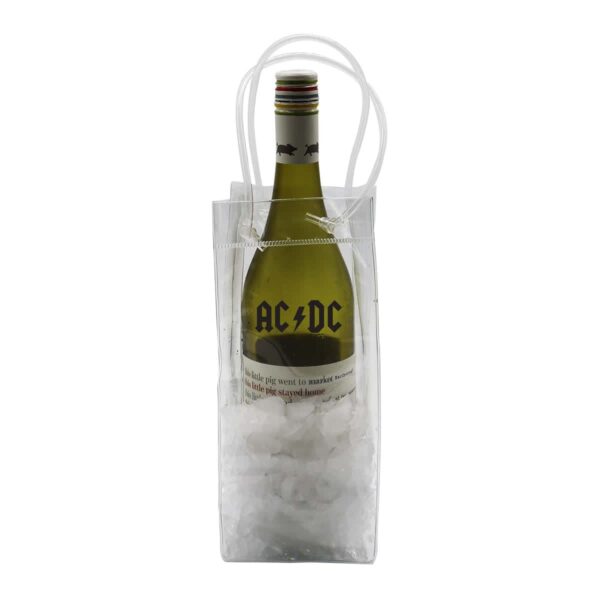 A bottle of white wine labeled AC/DC is chilling in a transparent ice bag filled with ice cubes. The bag has two clear handles.