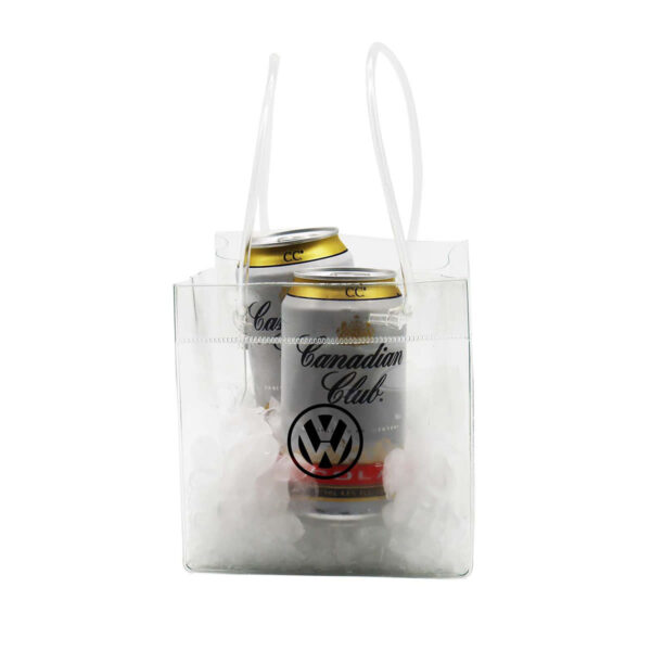 Two cans of Canadian Club are placed in a transparent plastic cooler bag filled with ice. The bag has white handles and displays a logo on the front.