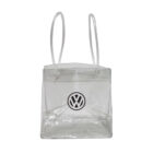 A transparent tote bag with long handles and a zipper closure. It features a black circular logo with overlapping V and W letters centered on the front.