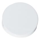 A plain white, round plastic lid or cap, viewed from above.