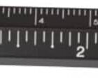 A black multifunction pen with measurement markings along the side, resembling a ruler. It has a silver tip on one end and a black rubber tip on the other end.