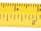 A yellow pen with a built-in ruler marked from 0 to 4 centimeters. The pen has a silver grip and a black eraser at the end, combining functionality for writing and measurement.