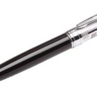 A sleek black and silver pen with a metallic clip and engraved texture on the upper part. The word ELECTRONICS is visible on the silver section.
