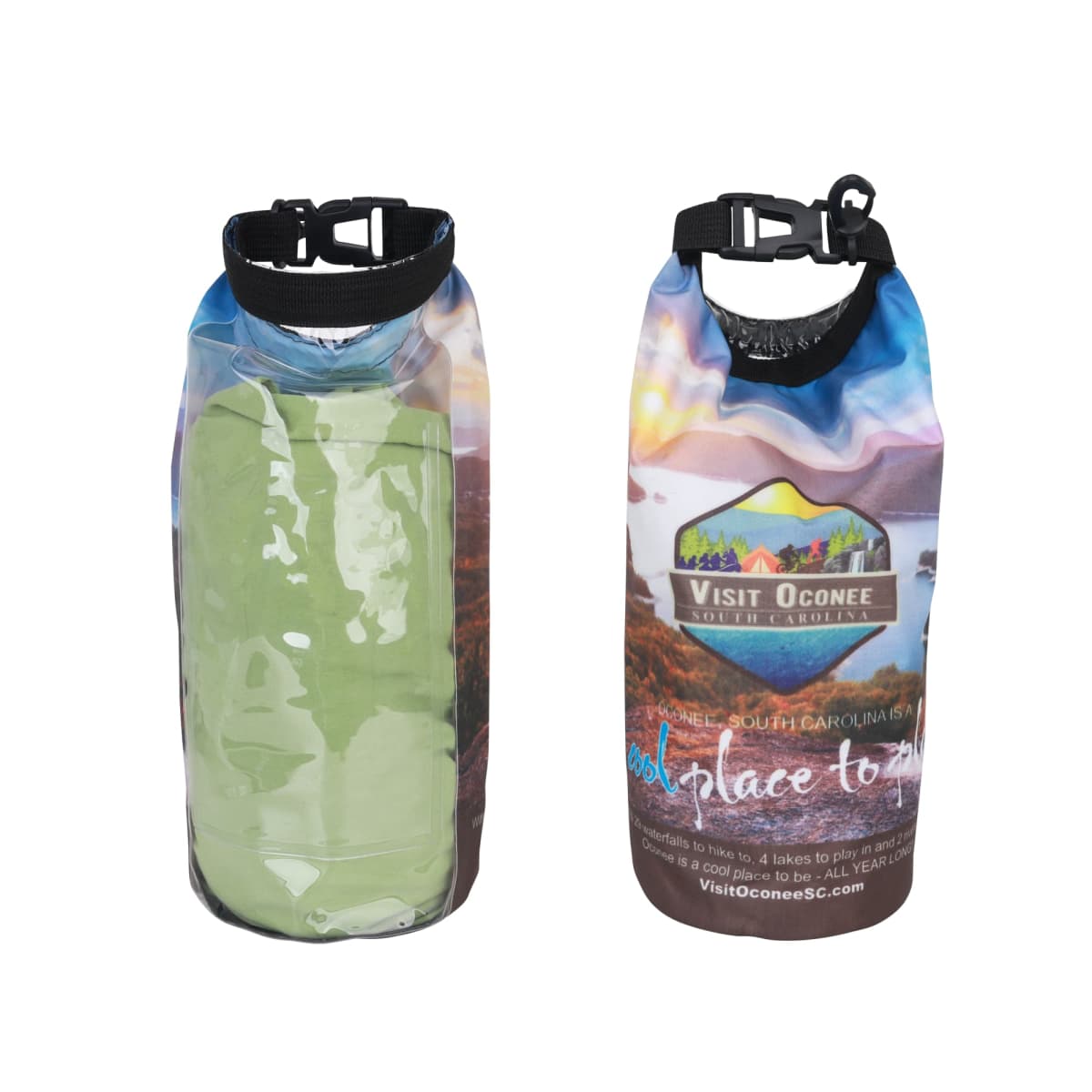 Two waterproof dry bags with a vivid outdoor design. The bag on the right displays a topographical scene with mountains and water, featuring the text Visit Oconee South Carolina. The bag on the left is partially transparent, showing a rolled-up towel.