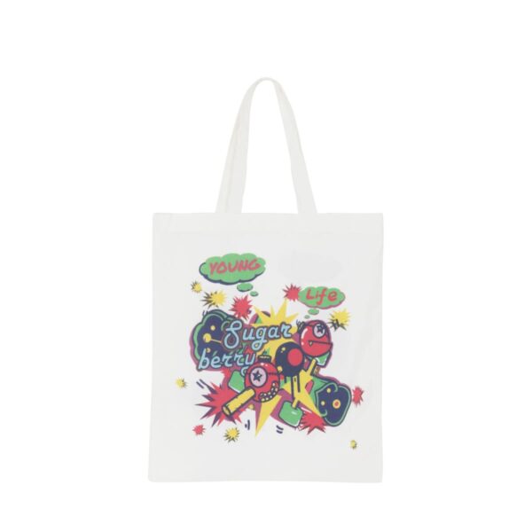A white tote bag featuring vibrant cartoon-style graphics with phrases like Young, Life, and Sugar Better in colorful, bold fonts, alongside playful, abstract illustrations with stars and bursts on a plain background.