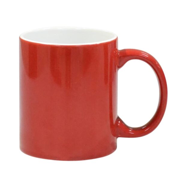 A plain red ceramic mug with a smooth, glossy finish. The mug has a C-shaped handle and is empty, set against a white background.