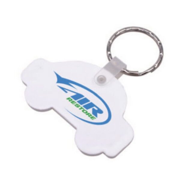 A white, car-shaped keychain with a metal ring. It features a blue and green logo with the text ZUR RESTORE.
