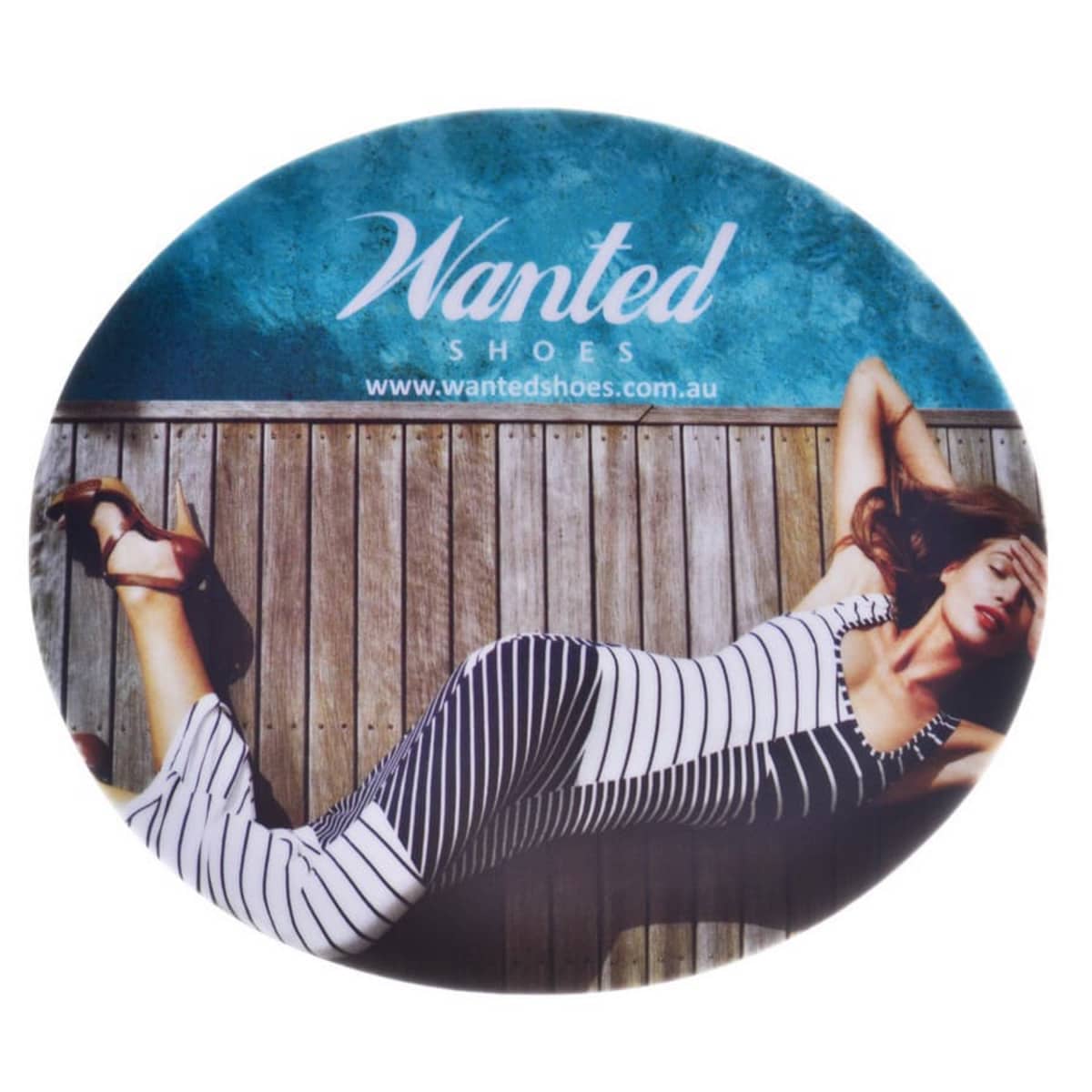Woman in striped dress lies on a wooden bench, text reads Wanted Shoes.