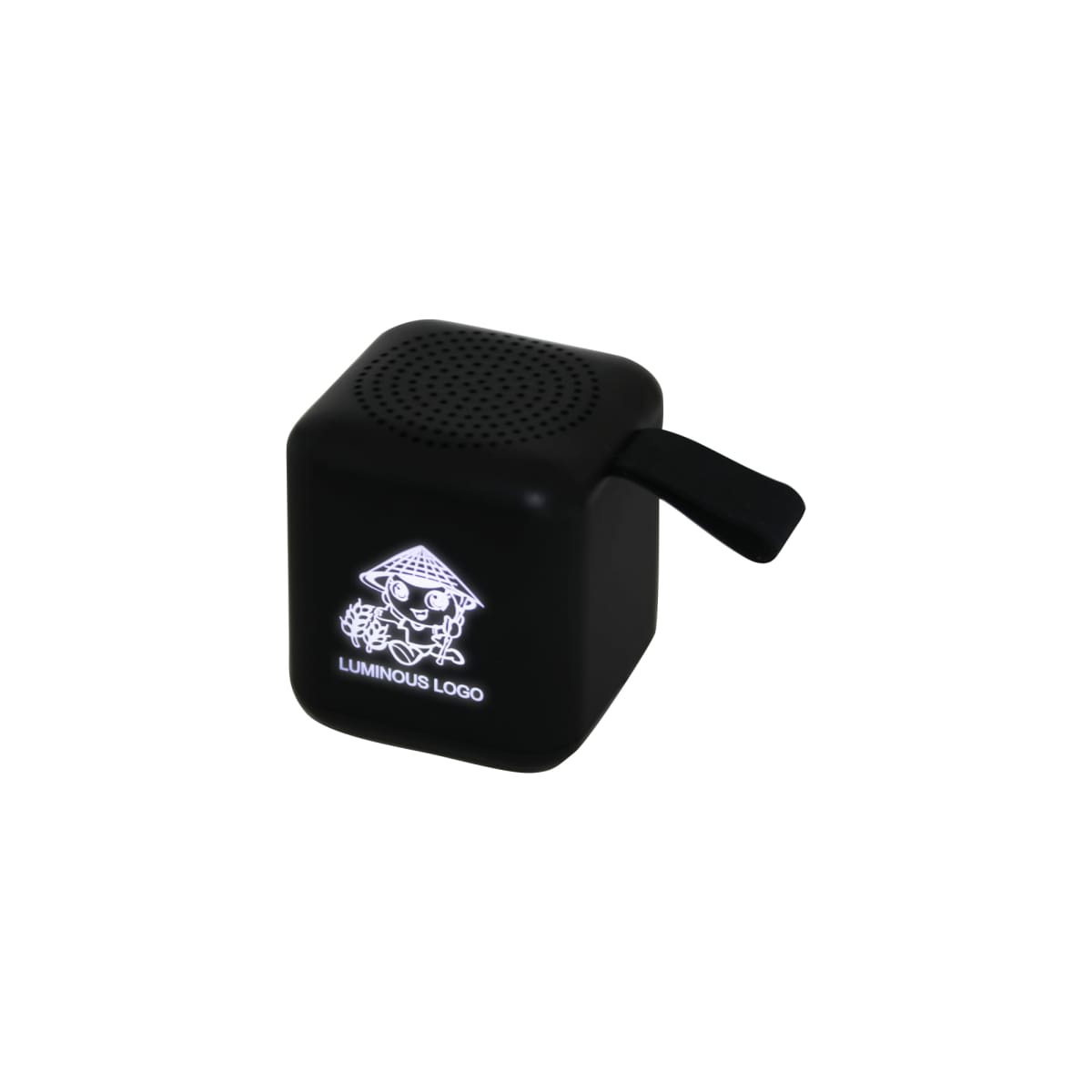 A small black cube-shaped speaker with a handle on the side. The front displays a glowing logo of a cartoon monkey with a straw hat and flowers. The words Luminous Logo are printed below the design.