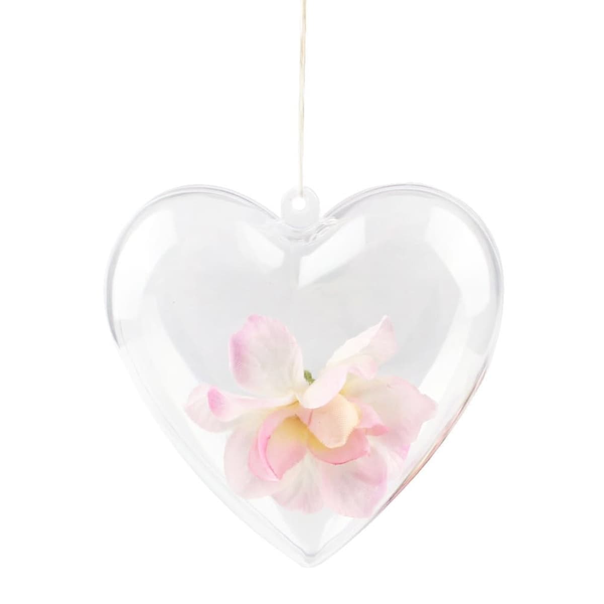 A clear heart-shaped ornament with pink and white flowers inside, hanging by a thin string. The transparent design showcases the delicate petals, giving it an elegant and romantic appearance.