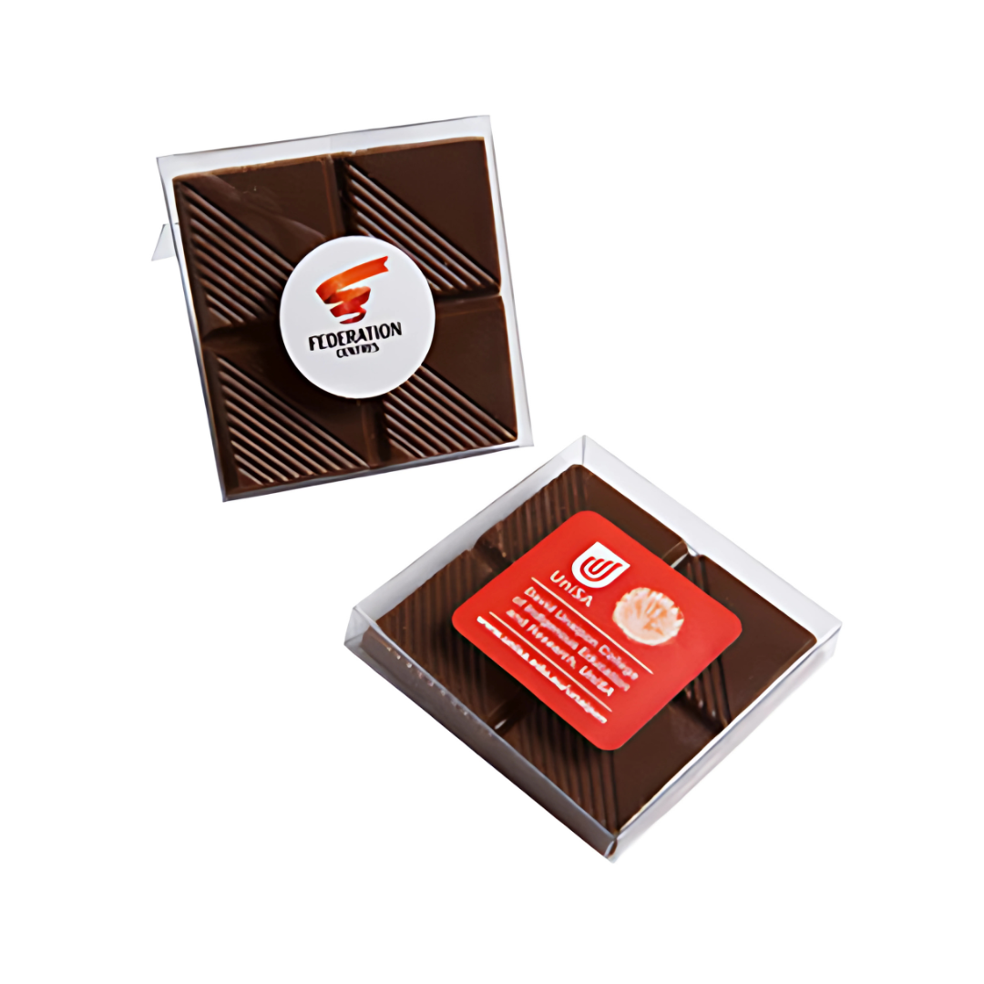 Two geometric-patterned chocolate boxes are displayed. One features a Federation Coffee logo, and the other has a red label with details. These Personalised Chocolate Stand Box Gifts come in clear plastic packaging, ideal for any occasion.