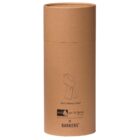 Brown cylindrical packaging featuring a minimal illustration of a scarf, labeled 100% Merino Scarf. The packaging includes logos for eco-friendly and fair-trade initiatives.